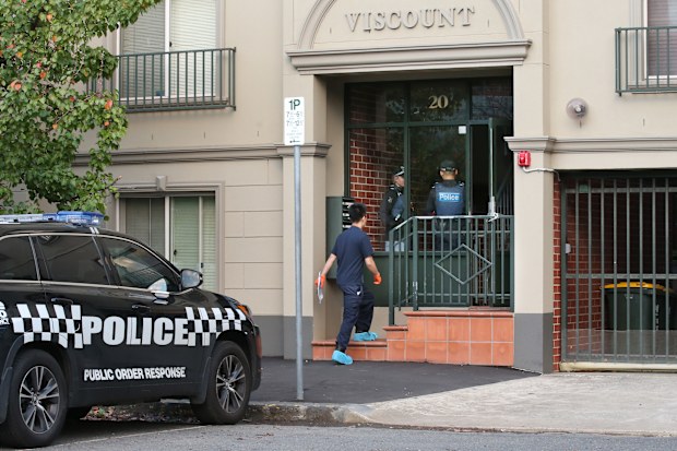 Officers remain on guard at a Bedford Street address after two people were arrested in a counter terrorism operation by Victoria Police.