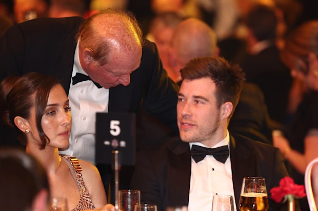 David Barham, President of the Essendon Bombers, speaks with Zach Merrett of the Bombers during the 2025 Brownlow Medal at Crown Palladium on September 22, 2025 in Melbourne, Australia. (Photo by James Wiltshire/AFL Photos via Getty Images)