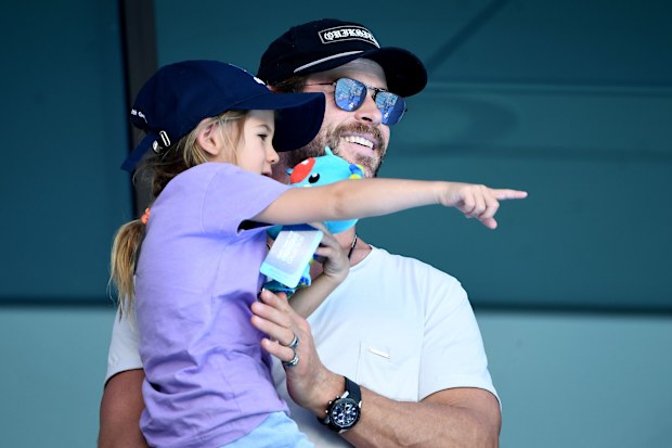 Actor Chris Hemsworth and daughter India Rose Hemsworth attend the swimming on day three of the Gold Coast 2018 Commonwealth Games at Optus Aquatic Centre on April 7, 2018 on the Gold Coast, Australia.