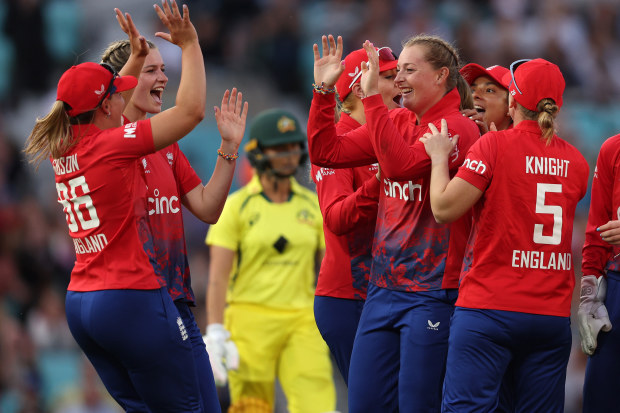 Sophie Ecclestone of England is congratulated as Ash Gardener of Australia is run out.