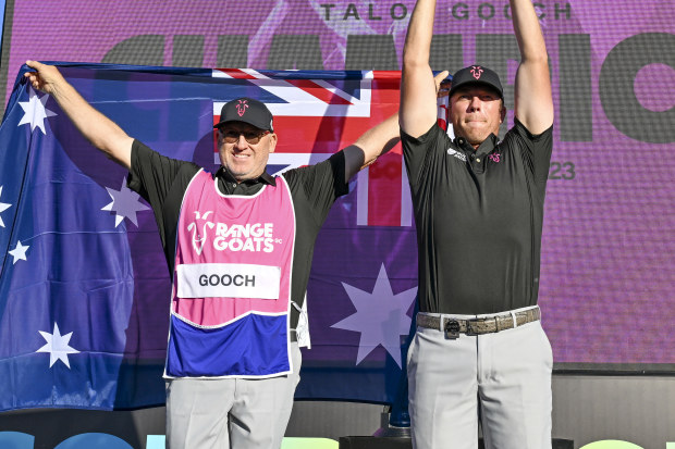 Talor Gooch of the RangeGoats holds up the LIV Golf trophy in Adelaiade.