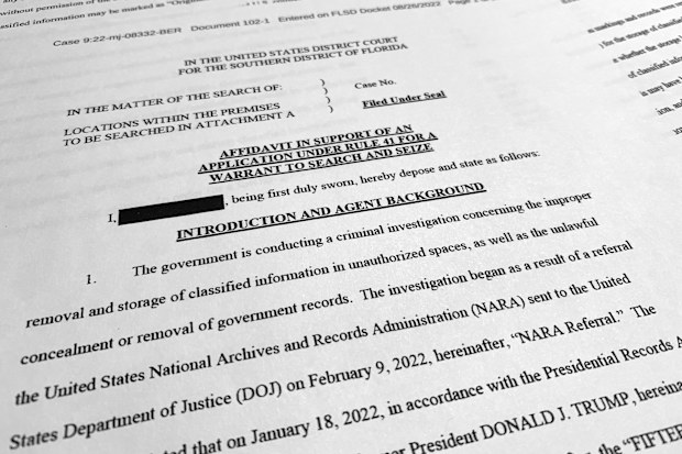 The affidavit by the FBI in support of obtaining a search warrant for former President Donald Trump's Mar-a-Lago estate is photographed Friday, August 26, 2022