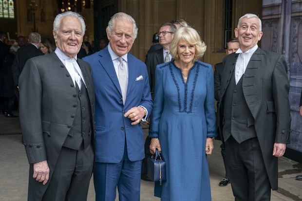King Charles III and Camilla, Queen Consort pose with House of Lords Lord Mcfaull of Alcluith (left) and The Speaker of the House of Commons, The Rt Hon Sir Lindsay Hoyle (right) as the King and the Queen Consort attend Westminster Hall Reception at Westminster Hall on May 2, 2023 in London.