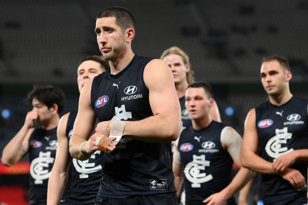 MELBOURNE, AUSTRALIA - AUGUST 27: Jacob Weitering and his Blues team mates look dejected after losing the round 24 AFL match between Carlton Blues and Greater Western Sydney Giants at Marvel Stadium, on August 27, 2023, in Melbourne, Australia. (Photo by Quinn Rooney/Getty Images)