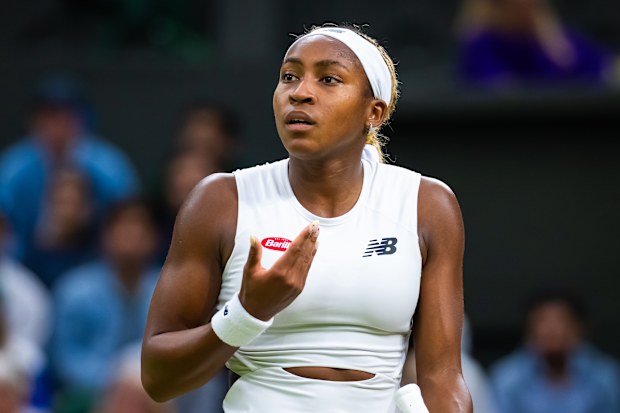 Coco Gauff reacts during her fourth-round loss to Emma Navarro.