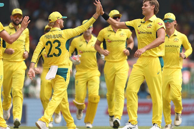 Spencer Johnson (right) and Jake Fraser-McGurk embrace after a Sri Lankan wicket falls.