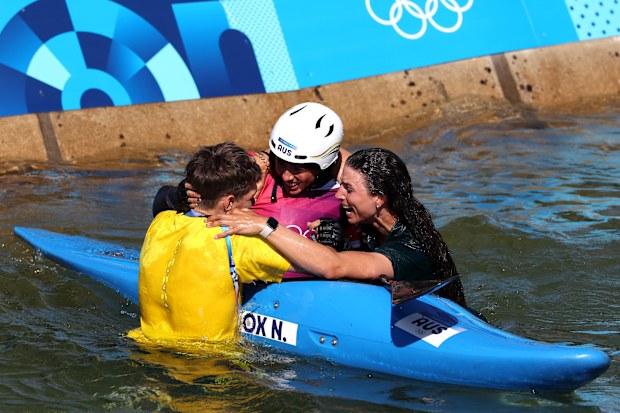 PARIS, FRANCE - AUGUST 05: Noemie Fox of Team Australia celebrates with her sister Jessica Fox after winning gold in the Canoe Slalom Women's Kayak Cross Final on day ten of the Olympic Games Paris 2024 at Vaires-Sur-Marne Nautical Stadium on August 05, 2024 in Paris, France. 