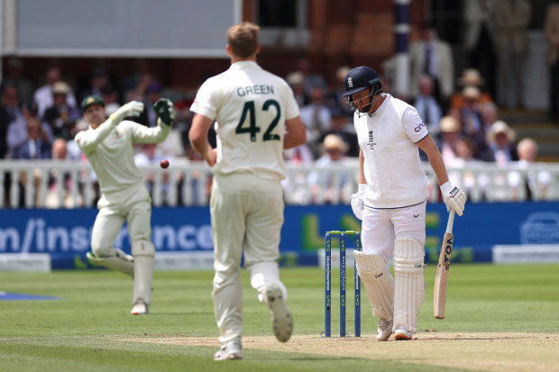 Jonny Bairstow wanders from his crease as Australia's Alex Carey throws the ball at his strumps, getting England's batter out.