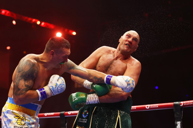 Oleksandr Usyk punches Tyson Fury during the IBF, WBA, WBC, WBO and Undisputed Heavyweight titles' fight between Tyson Fury and Oleksandr Usyk at Kingdom Arena on May 18, 2024 in Riyadh, Saudi Arabia. (Photo by Richard Pelham/Getty Images)