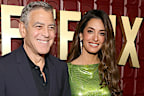 BEVERLY HILLS, CALIFORNIA - JANUARY 11: (L-R) George Clooney and Amal Clooney attend Netflix's Golden Globe afterparty 2026 at Spago on January 11, 2026 in Beverly Hills, California.  (Photo by Emma McIntyre/Getty Images for Netflix)