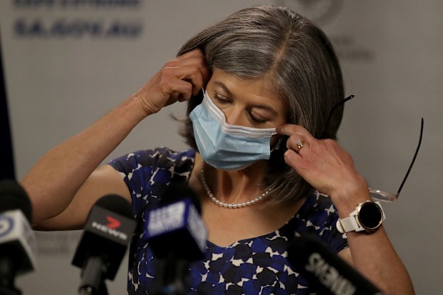 South Australian Chief Public Health Officer Nicola Spurrier removes her mask during the COVID-19 daily update on November 18, 2020 in Adelaide, Australia. 