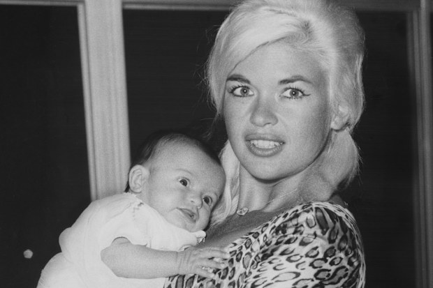 Jayne Mansfield holding six-weeks old Mariska Hargitay, United States, March 1964. (Photo by Archive Photos/Getty Images)