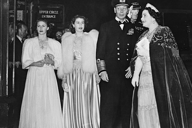 The royal family arrive at the London Palladium for the Royal Variety Performance, 5th November 1946. Left to right: Princess Margaret (1930 - 2002), Princess Elizabeth (later Queen Elizabeth II), King George VI (1895 - 1952) and Queen Elizabeth (1900 - 2002, later Queen Mother). (Photo by Keystone/Hulton Archive/Getty Images)