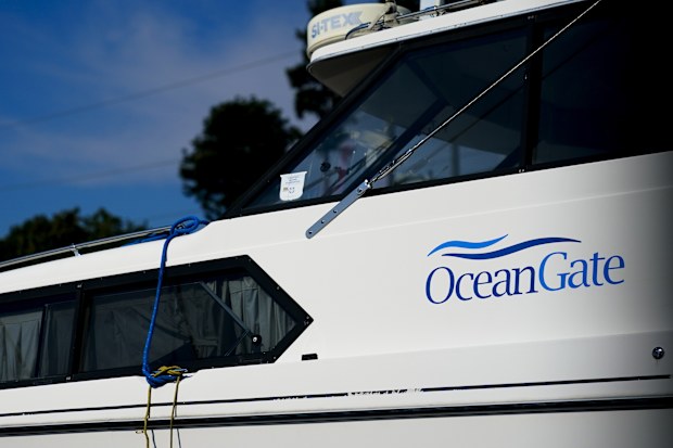 A boat with the OceanGate logo is parked on a lot near the OceanGate offices Thursday, June 22, 2023, in Everett, Wash.  
