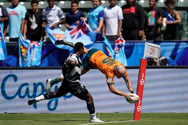 Australia's James Turner goes over to score a try.