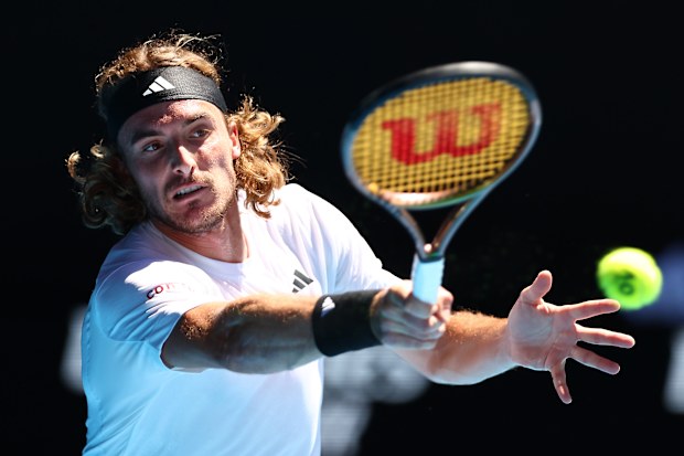 Stefanos Tsitsipas of Greece plays a forehand.