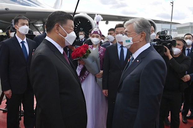 Kazakhstan  President Kassym-Jomart Tokayev, right, meets Chinese President Xi Jinping in an airport in Nur-Sultan, Kazakhstan, 