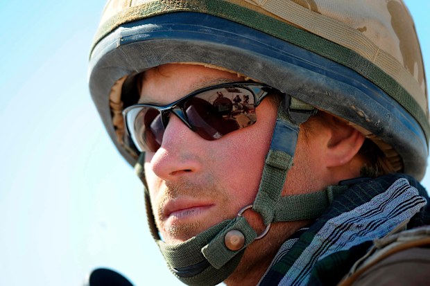 2008. Britain's Prince Harry  sits atop  a military vehicle in the Helmand province, Southern Afghanistan 