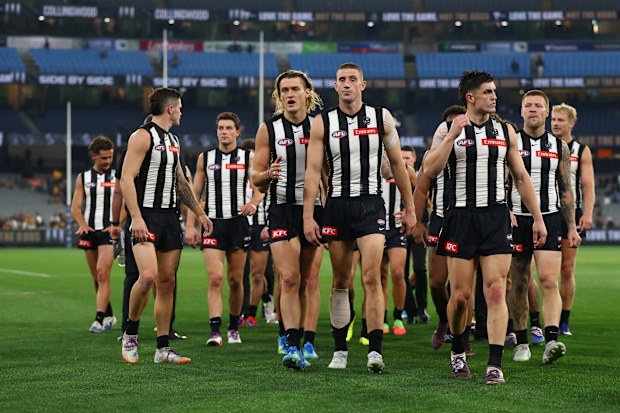 MELBOURNE, AUSTRALIA - APRIL 30: The Magpies walk off after the match ended in a draw during the round eight AFL match between Collingwood Magpies and Hawthorn Hawks at Melbourne Cricket Ground, on April 30, 2026, in Melbourne, Australia. (Photo by Robert Cianflone/Getty Images)