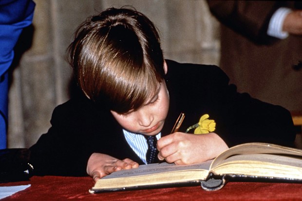 UNITED KINGDOM - MARCH 01:  Prince William Signing A Visitors Book In Wales On St. David's Day. This Is His First Official Engagement.  (Photo by Tim Graham Photo Library via Getty Images)