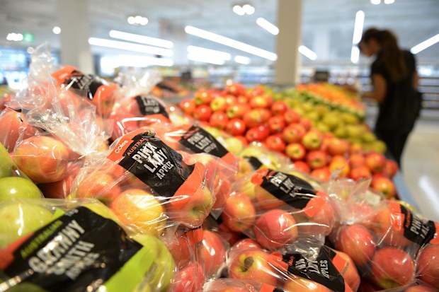 Store brand packages of Pink Lady apples are displayed for sale in the produce section of a Coles supermarket, operated by Wesfarmers Ltd., in Melbourne, Australia, on Tuesday, Feb. 23, 2016. Wesfarmers, Australia's largest retailer, is scheduled to report interim results on Feb. 24. Photographer: Carla Gottgens/Bloomberg