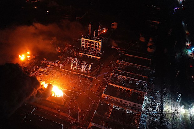 Fires burned at the site of a factory explosion in a chemical industrial park in Xiangshui County of Yancheng in eastern China's Jiangsu province well into the night. (Ji Chunpeng/Xinhua via AP)