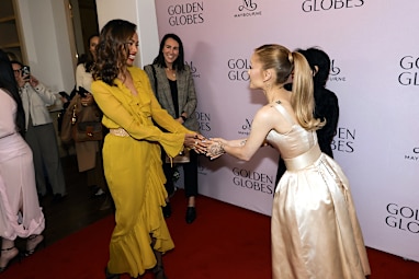 Zoe Saldaña and Ariana Grande