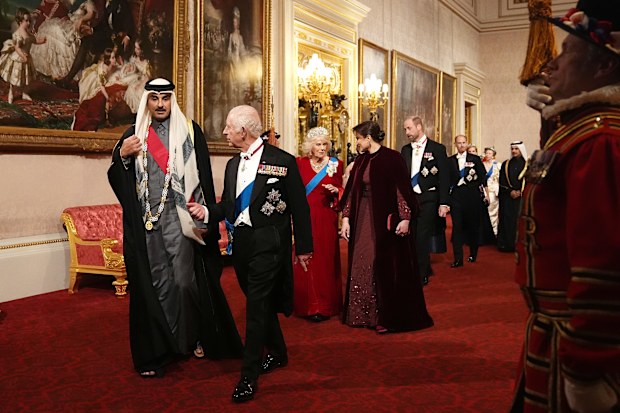 King Charles III (2nd left) with the Emir of Qatar Sheikh Tamim bin Hamad Al Thani (left) with Queen Camilla and the Emir of Qatar's wife Sheikha Jawaher make their way along the East Gallery to attend the state banquet for the Emir of Qatar Sheikh Tamim bin Hamad Al Thani at Buckingham Palace, London, during his state visit to the UK. Picture date: Tuesday December 3, 2024. 