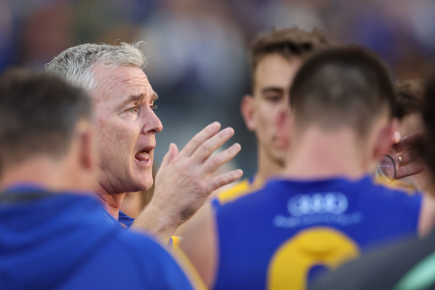 Adam Simpson addresses his side during their match against Hawthorn.
