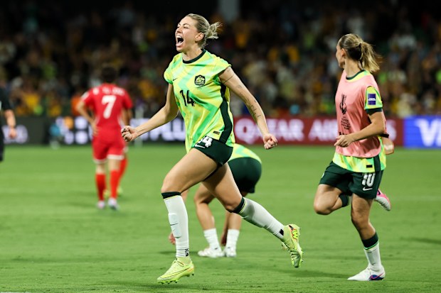 Alanna Kennedy celebrates victory after the Asian Cup quarter final against DPR Korea. 