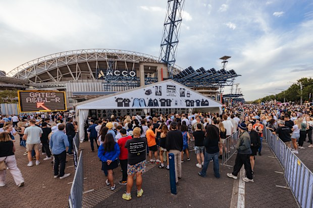 Excited fans arrive at Accor Stadium to see Oasis as part of their Live '25 global tour in Sydney Australia