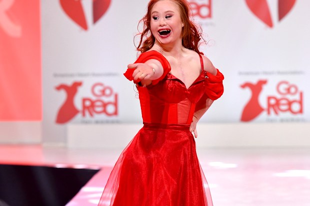 Madeline Stuart walks the runway at The American Heart Association's Go Red for Women Red Dress Collection 2020 