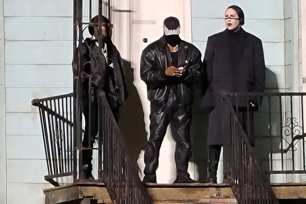 From left to right: DaBaby, Kanye West and Marilyn Manson during the Donda event on August 26, 2021 in Chicago, Illinois. 