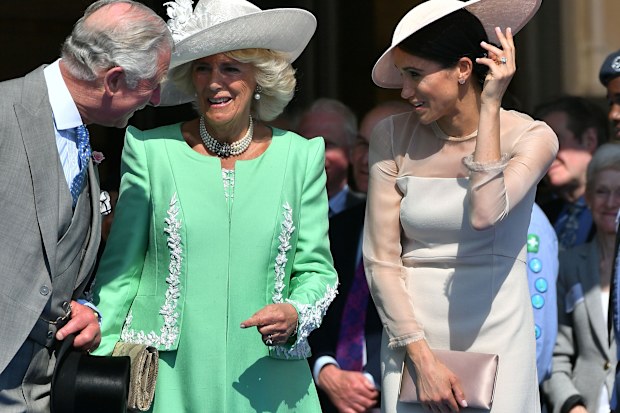 LONDON, ENGLAND - MAY 22:  Prince Charles, Prince of Wales, Camilla, Duchess of Cornwall and Meghan, Duchess of Sussex attend The Prince of Wales' 70th Birthday Patronage Celebration held at Buckingham Palace on May 22, 2018 in London, England.  (Photo by Dominic Lipinski - Pool/Getty Images)