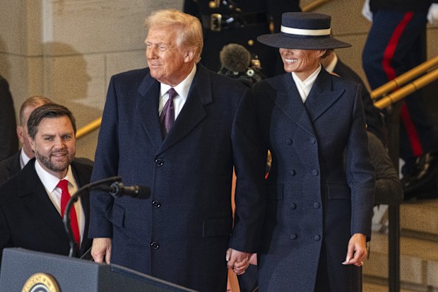 President Donald Trump and first lady Melania Trump arrive in Emancipation Hall after the 60th Presidential Inauguration, Monday, Jan. 20, 2025, at the U.S. Capitol in Washington. 
