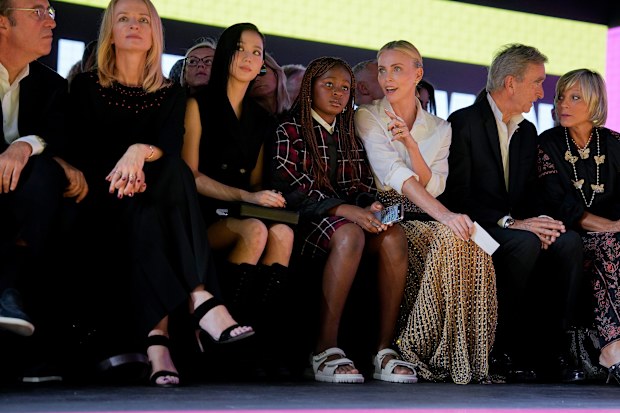 Charlize Theron and daughter Jackson, 11, in the front row of the Dior show at Paris Fashion Week.
