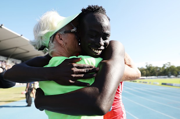 Gout Gout and his coach Di Sheppard.