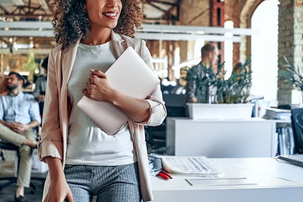Young businesswoman in office