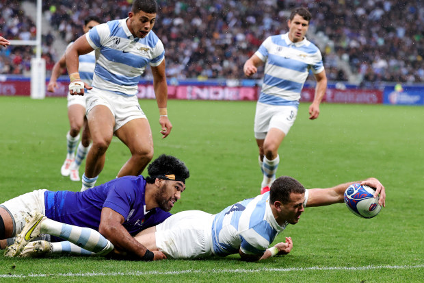 Emiliano Boffelli of Argentina scores his team's first try during the Rugby World Cup match against Samoa.