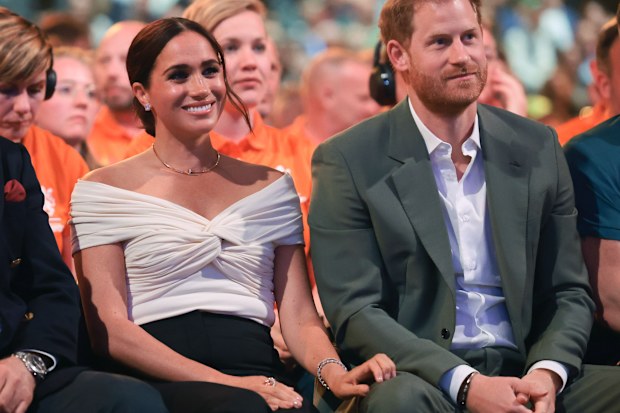 Prince Harry, Duke of Sussex and Meghan, Duchess of Sussex attend the Invictus Games The Hague 2020 Opening Ceremony at Zuiderpark on April 16, 2022 in The Hague, Netherlands. (Photo by Chris Jackson/Getty Images for the Invictus Games Foundation)
