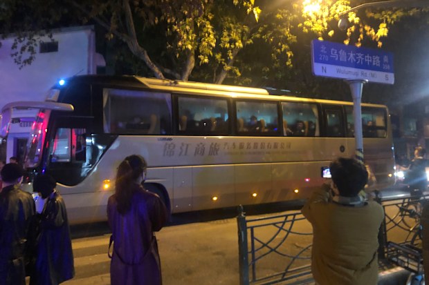 In this photo obtained by The Associated Press, protesters are taken away by police in a bus in Shanghai on Saturday, Nov. 26, 2022. Protests against Chinas restrictive COVID measures appeared in a number of cities Saturday night, in displays of public defiance fanned by anger over a deadly fire in the western Xinjiang region.