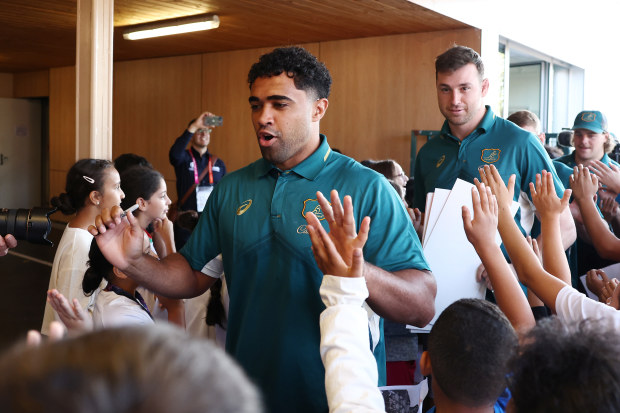 Langi Gleeson of the Wallabies arrives during a school visit.