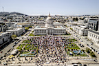 Demonstrators gather in Civic Center Plaza in San Francisco.Nearly 600,000 people had signed up to attend the events, some which took place in major cities like London and Paris