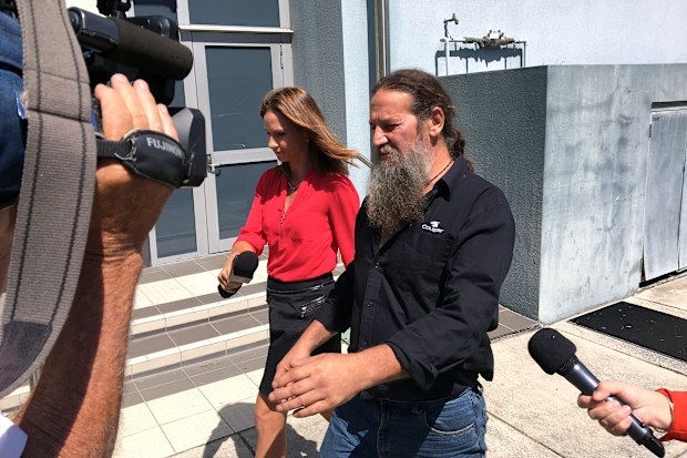 The husband of Miriam Annette Eason leaves court on the Gold Coast, Wednesday, March 23, 2016. Mrs Eason has been granted bail after allegedly shooting at her son-in-law and daughter during a domestic dispute in Nerang on Tuesday. She allegedly told police she couldn't believe she missed her shots and wanted to see an optometrist to fix her eyes before returning to do the job properly. (AAP Image/Ed Jackson) 