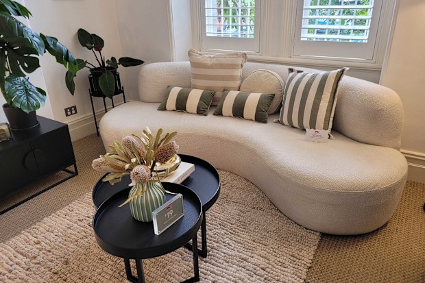 Kmart cushions styled on sofa