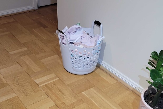 washing basket full of tea towels
