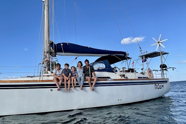 Erin Carey and her family on their sailboat.