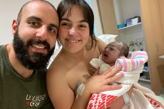 Nikolina Kharoufeh and son Leo with husband Nicholas.