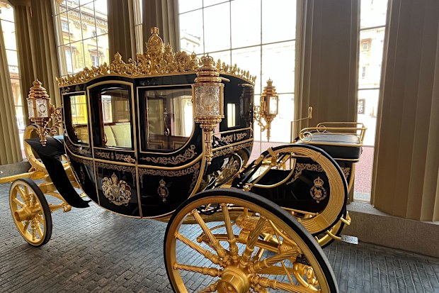 The Diamond Jubilee State Coach appears as you enter Buckingham Palace for the annual Summer Opening, which this year features a coronation exhibition.