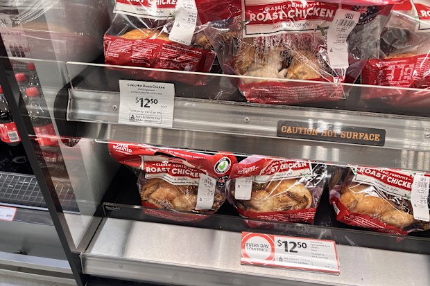 coles roast chickens display